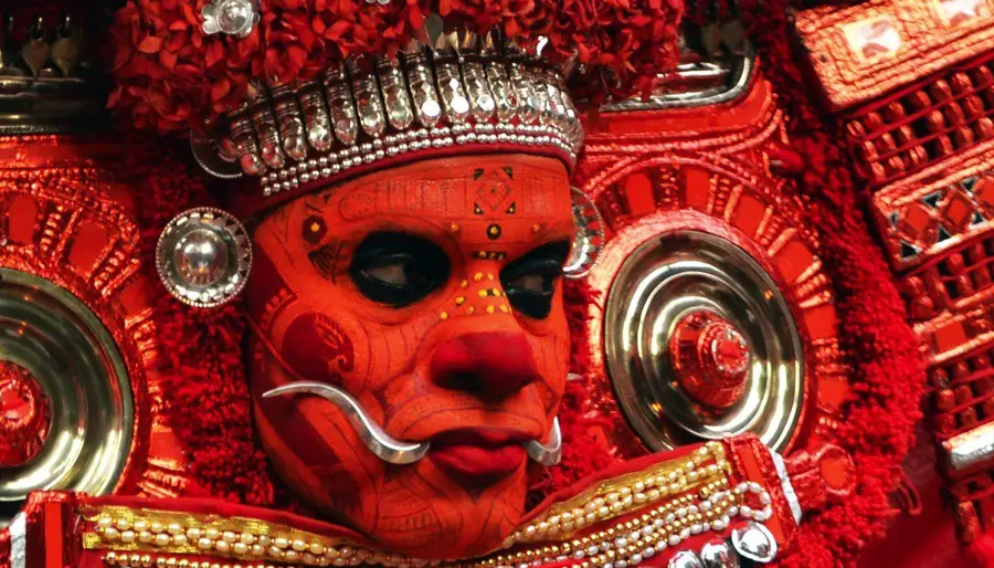 theyyam-india-painted-dancer