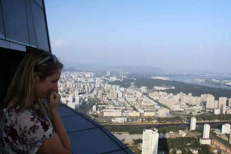 woman-looks-at-view-from-Ryugyong-hotel