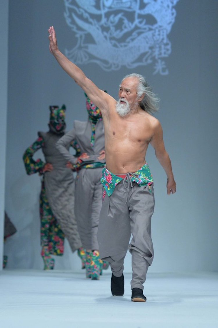 "79-year-old Chinese actor Wang Deshun displays a new creation by Chinese fashion designer Sheguang Hu at the Sheguang Hu fashion show during the China Fashion Week Fall/Winter 2015 in Beijing, China, 25 March 2015."